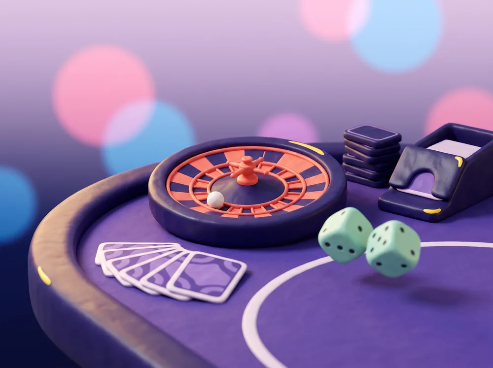 Roulette wheel, cards, dice and pai gow tiles on felt